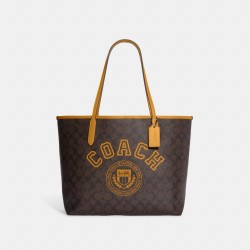 Women Coach City Tote in Signature Canvas with Varsity Motif Yellow