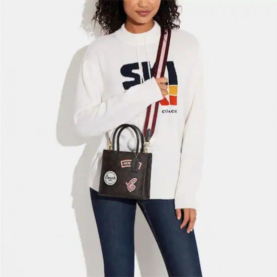 Mini cally crossbody deals in colorblock signature canvas